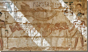 De processie met de Hnw-bark. Afbeelding in de tempel van Ramses III, Medinet Haboe